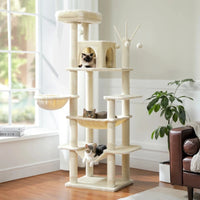 Arbre à chat multi-niveaux beige avec plusieurs chats se reposant