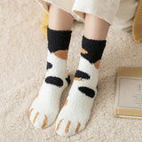 Présentation chaussettes chaudes d'hiver pattes de chat blanc et noir