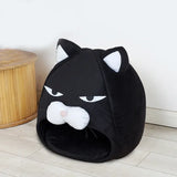 Couchage pour chat en forme de tête de chat noir