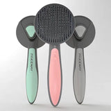 Peigne de toilettage pour chat disponible en trois couleurs, vert, rose et gris